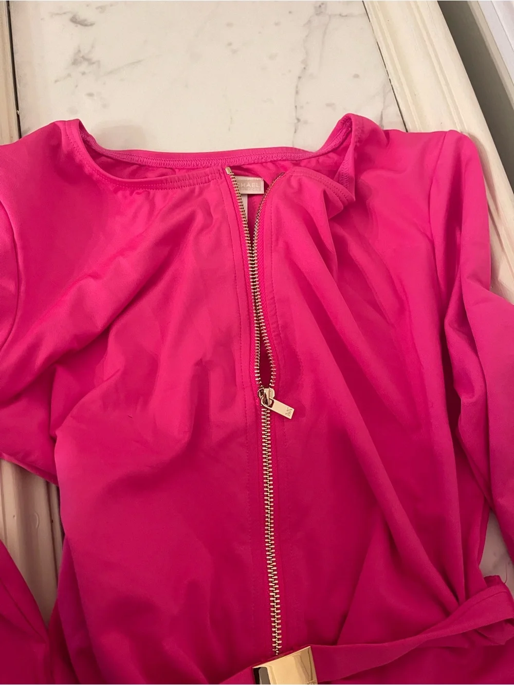 Michael Kors Hot Pink Long-Sleeve One-Piece with Gold Zip and Belt Accent
